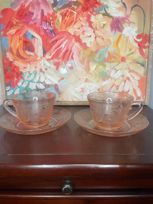 Set of two 1940s vintage pink floral tea cups with saucers