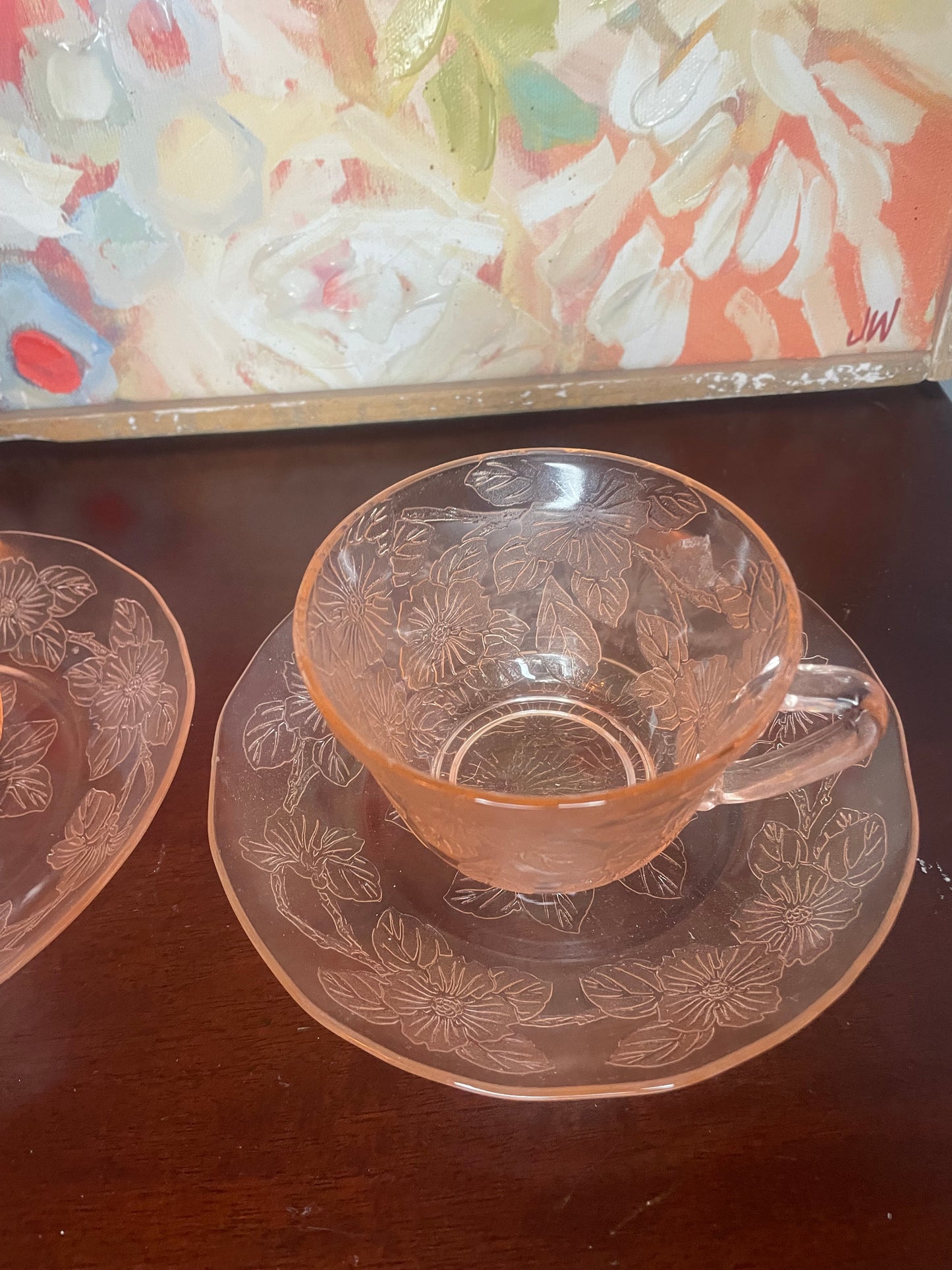 Set of two 1940s vintage pink floral tea cups with saucers